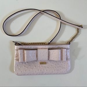 Pink ostrich leather Kate Spade crossbody purse.